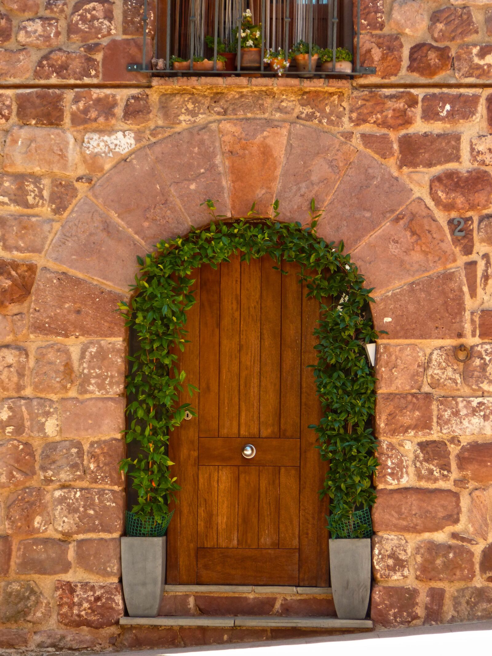 Panasonic DMC-FZ62 sample photo. Door, arch, carved stone photography