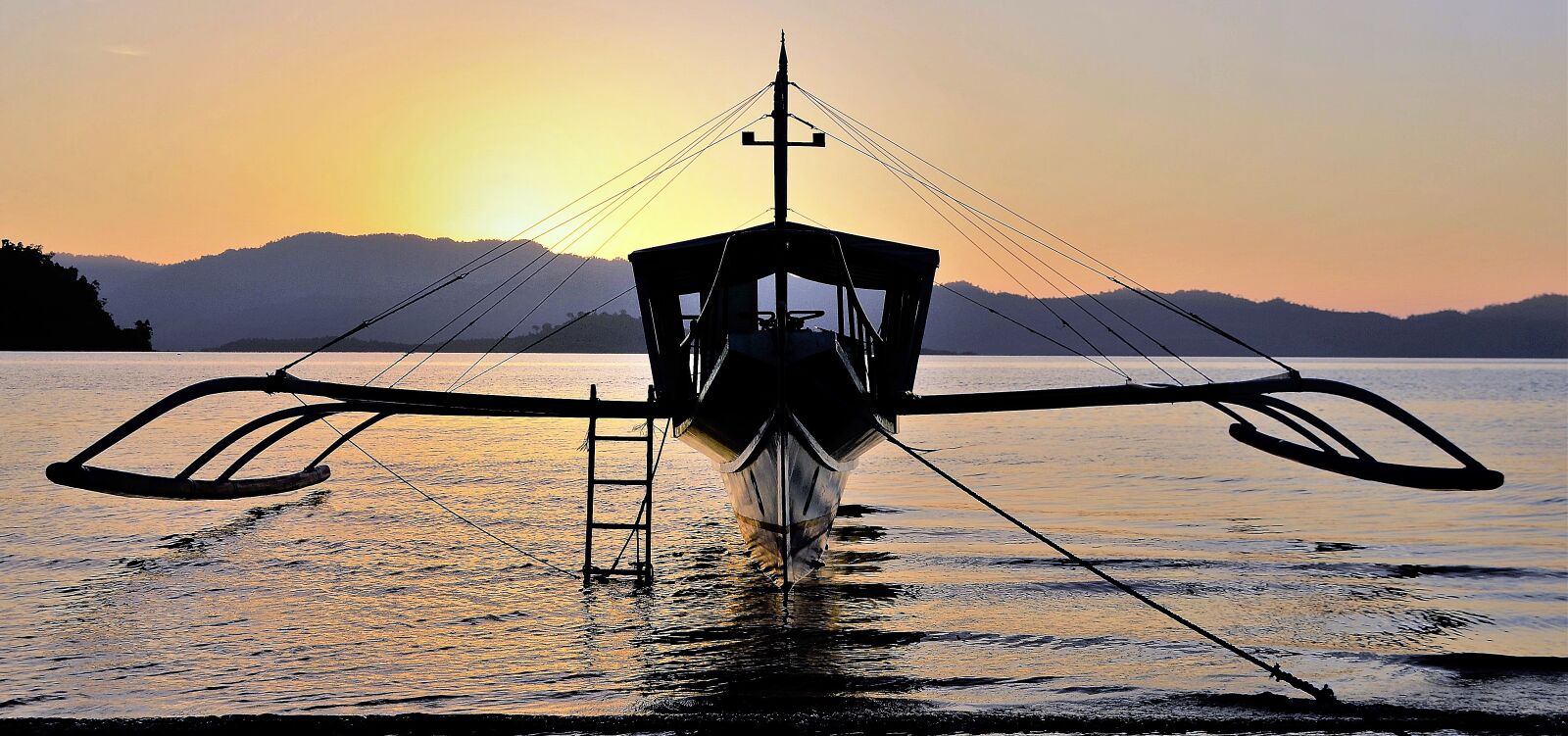 Nikon D5100 sample photo. Sunset, boat, water photography
