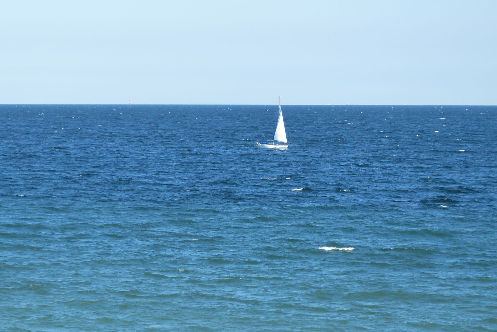 Panasonic Lumix DMC-FZ150 sample photo. Blue, sailing boat, sea photography