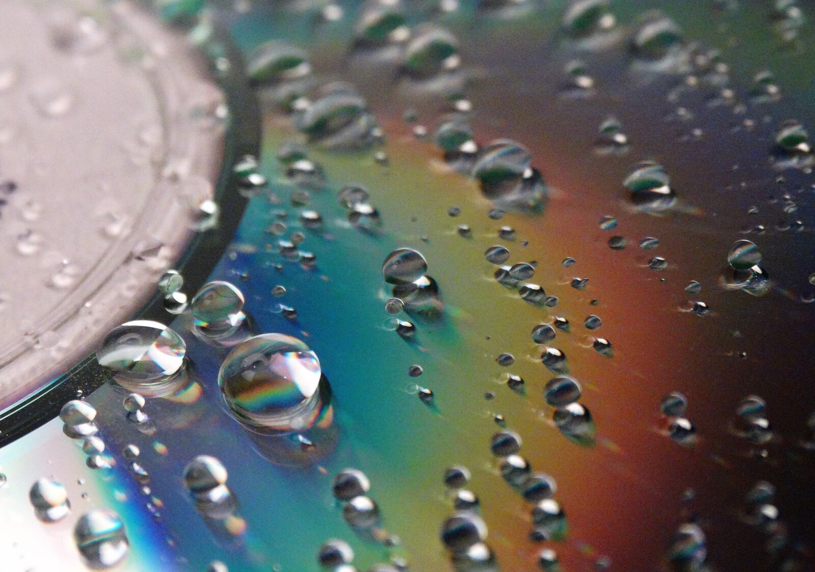 Sony Cyber-shot DSC-HX300 sample photo. Waterdrops, cd, rainbow photography