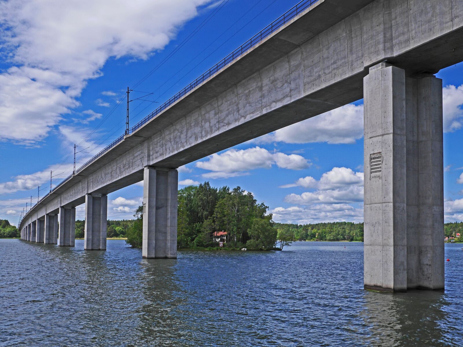 Panasonic Lumix DMC-GH3 sample photo. M laren, lake, railway photography