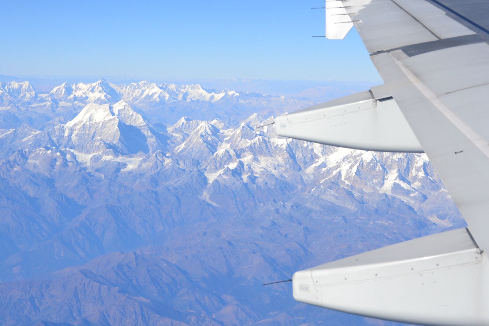 Nikon D3100 sample photo. Mountains, airplane, wing photography
