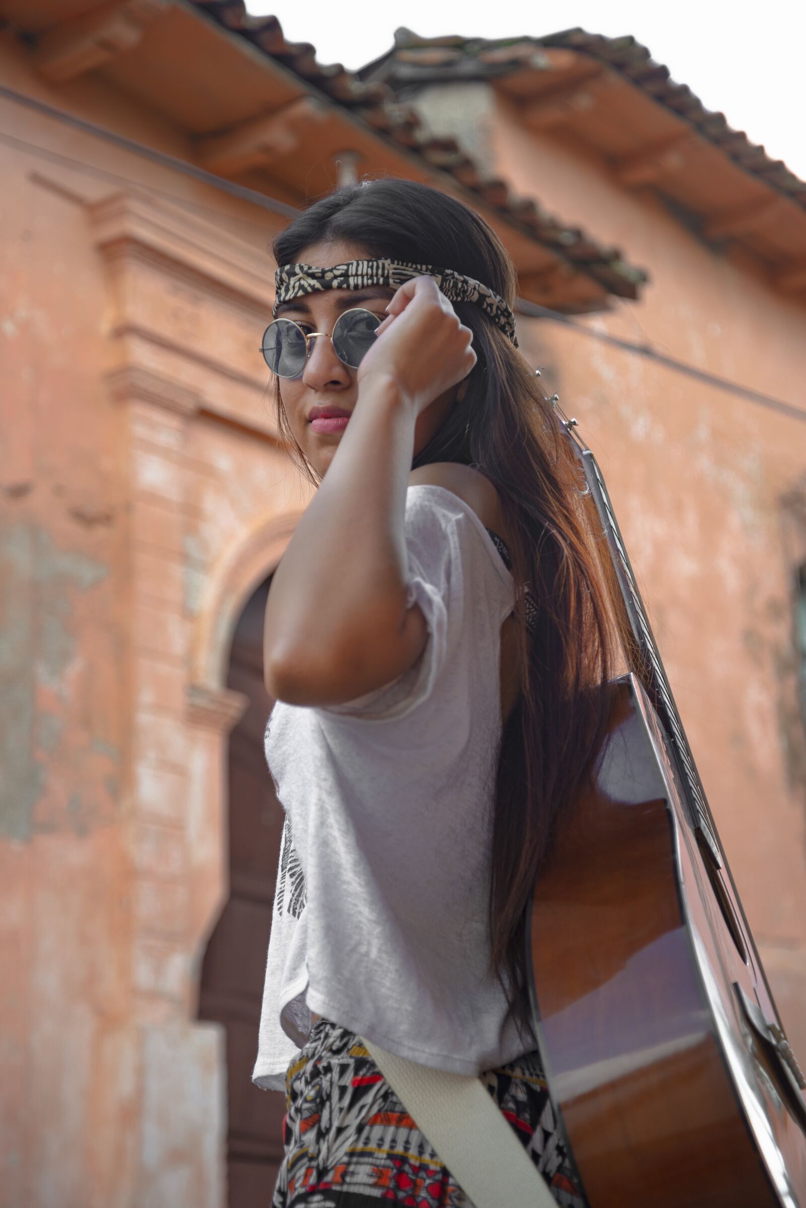 Nikon D610 sample photo. Lenses, guitar, women photography