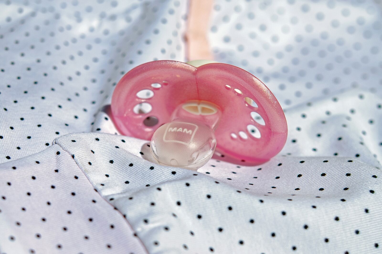 Fujifilm X-T10 + Fujifilm XF 35mm F1.4 R sample photo. Pacifier, pink, baby photography