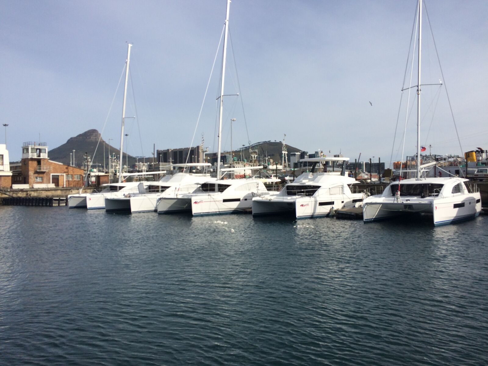 iPhone 5s back camera 4.15mm f/2.2 sample photo. Boats, mountains, sea photography