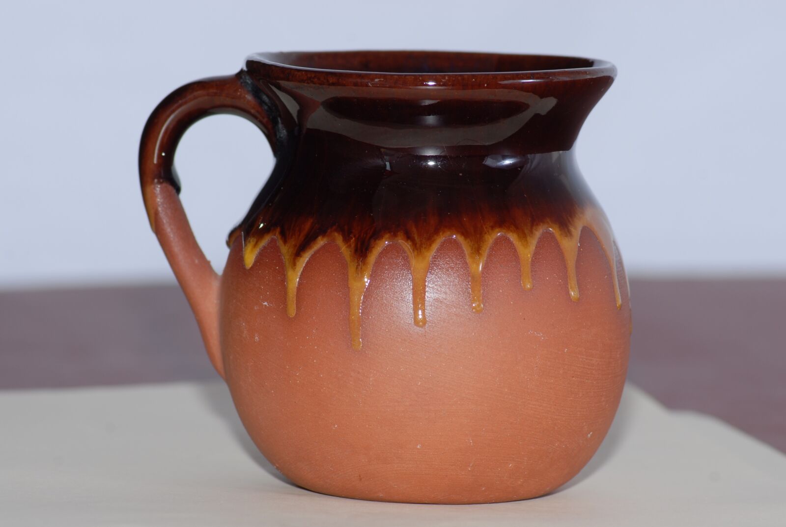 Nikon D200 sample photo. Pitcher, mud, rustic photography