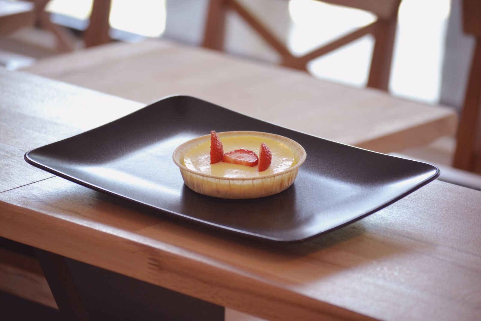Nikon D3100 sample photo. Cheesecake with strawberry, plated photography