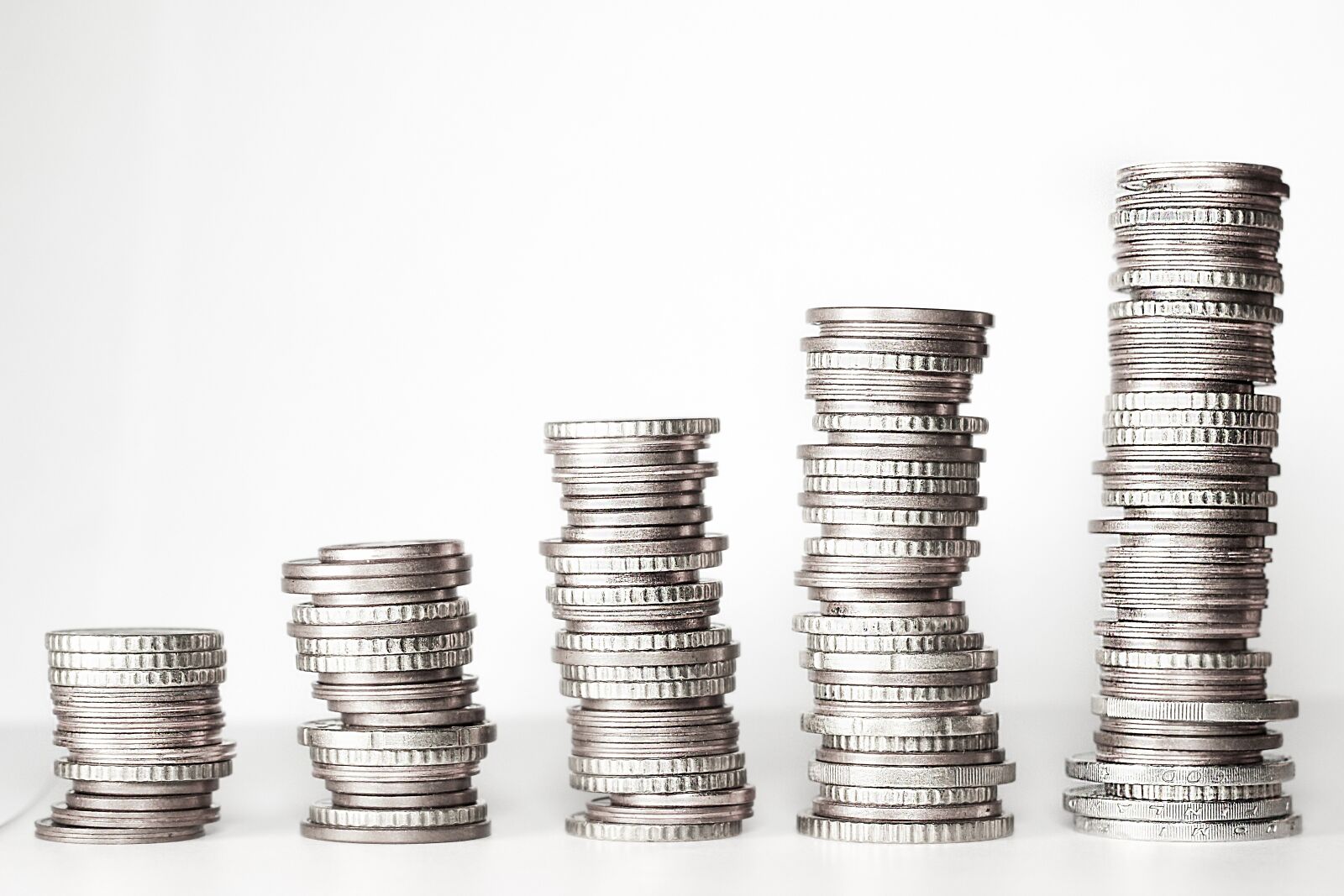 Canon EOS 600D (Rebel EOS T3i / EOS Kiss X5) + Canon EF 50mm F1.8 II sample photo. Money, money tower, coins photography