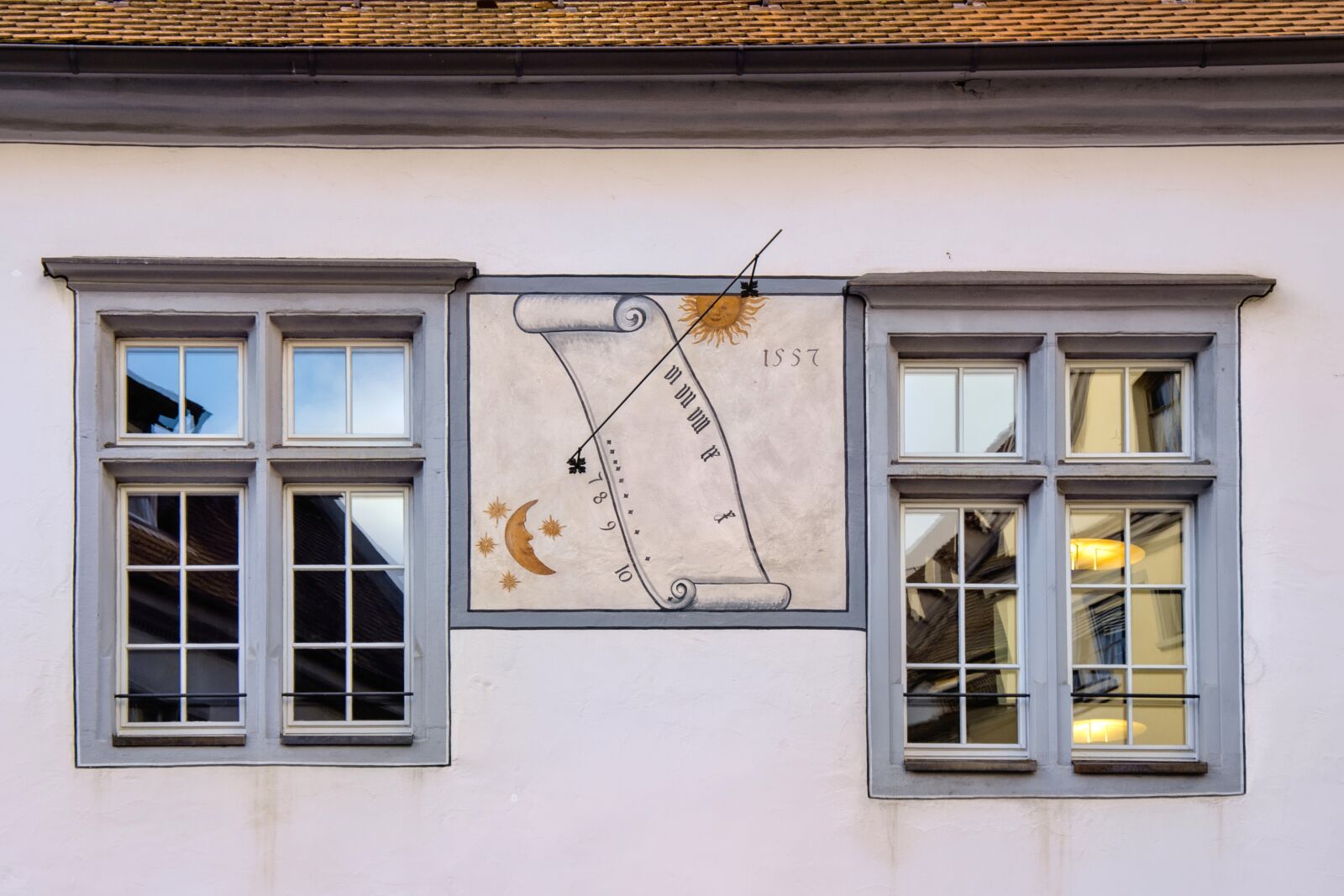 Nikon D5100 sample photo. Window, sundial, city of photography
