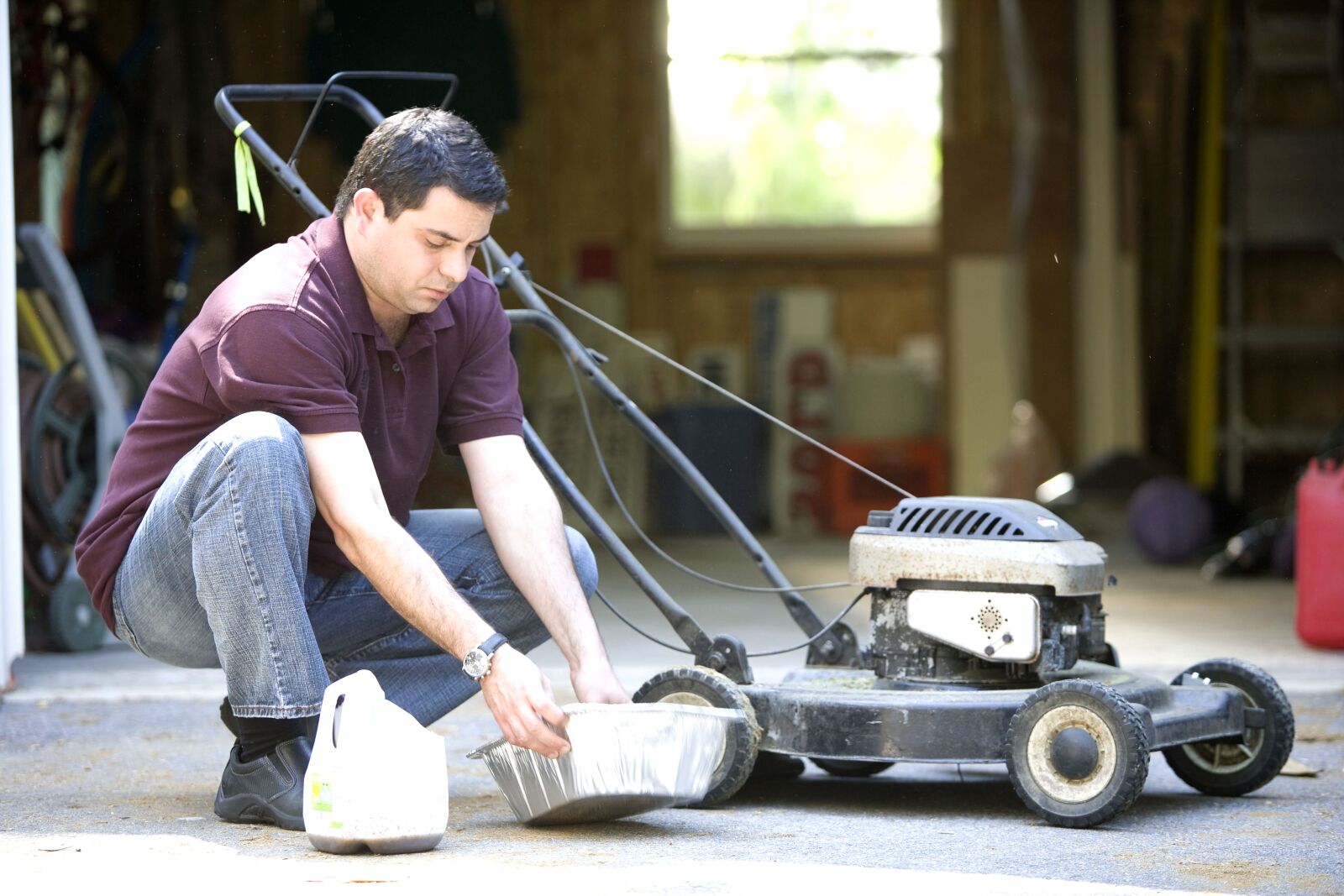 Canon EOS-1Ds Mark II sample photo. Man, changing, lawnmowers, oil photography