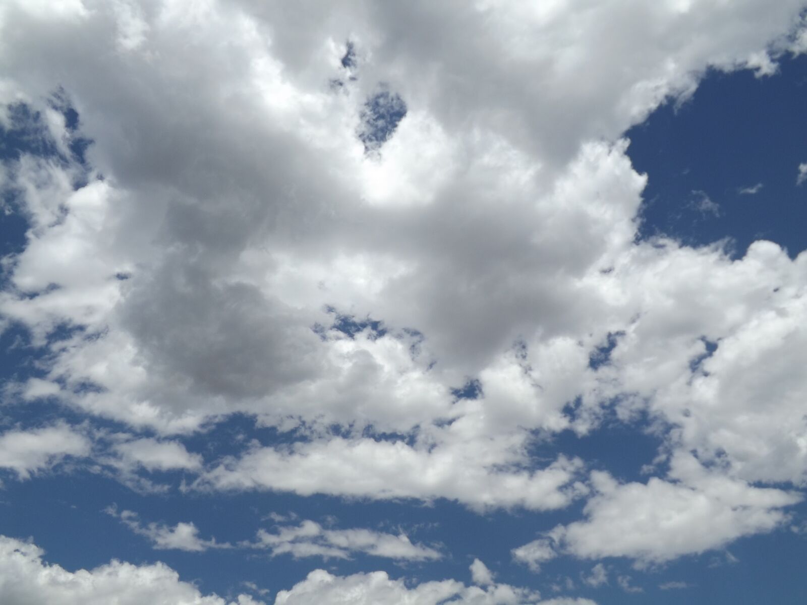 Fujifilm FinePix S4250WM sample photo. Fluffy clouds, sky, heaven photography