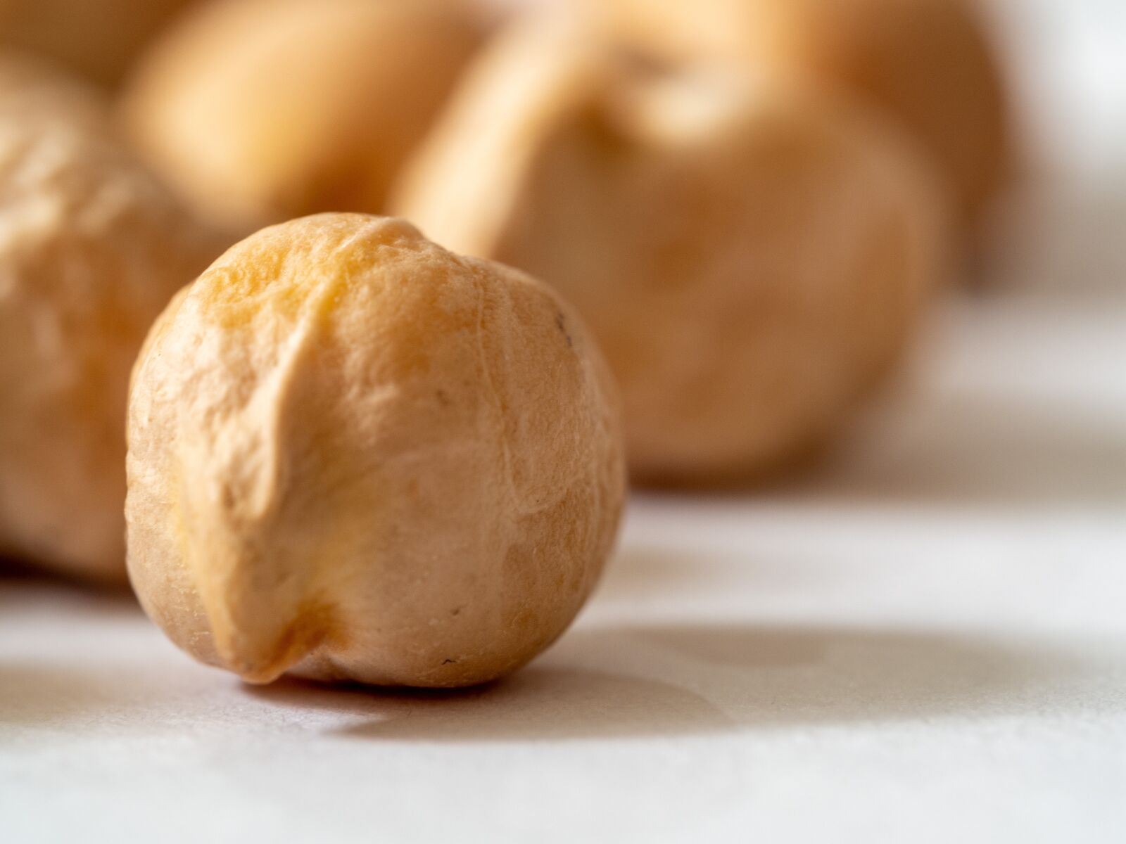 Olympus OM-D E-M10 III sample photo. Chickpeas, legumes, raw materials photography