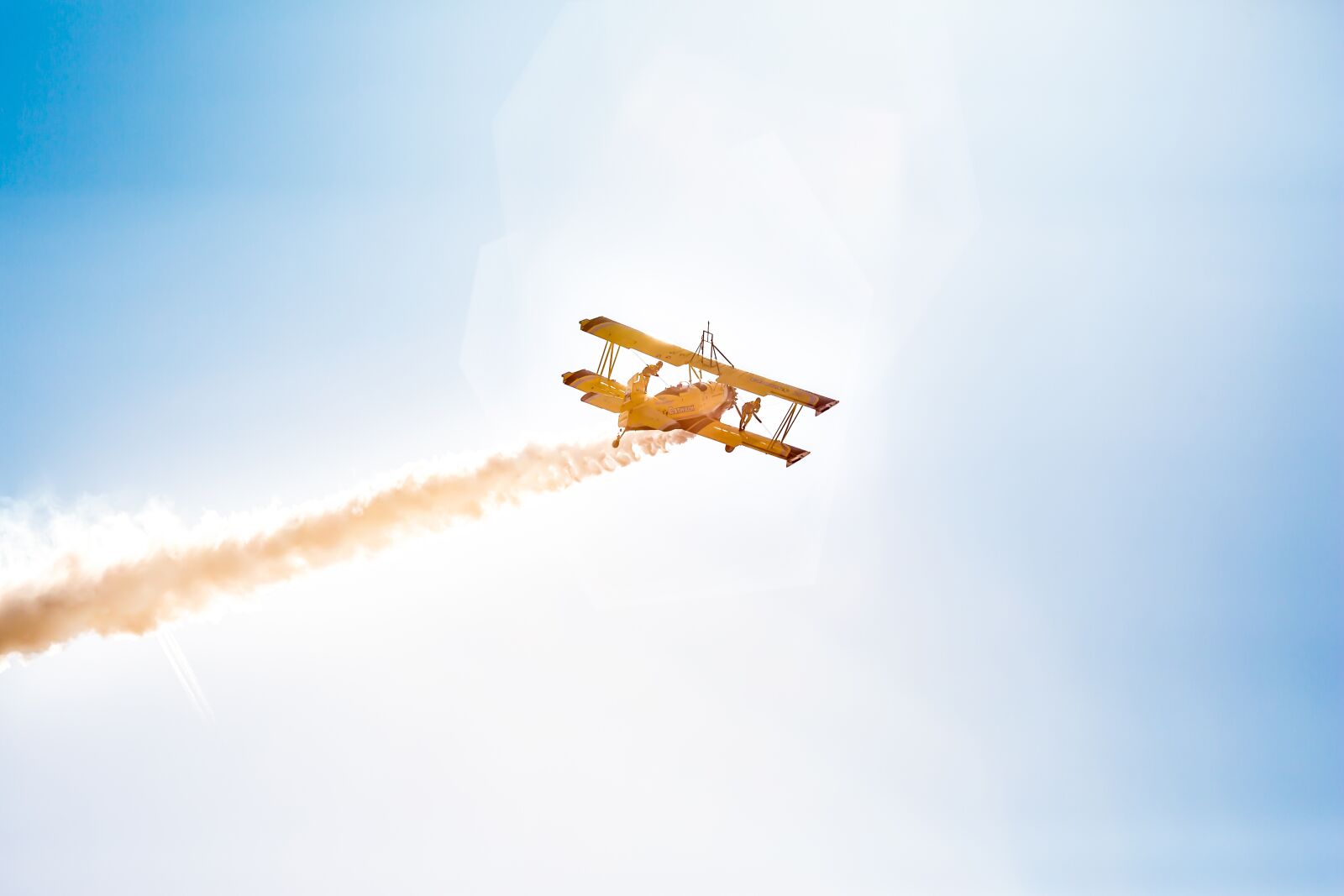 Canon EF 135mm F2L USM sample photo. Aerobatic, plane, smoke photography