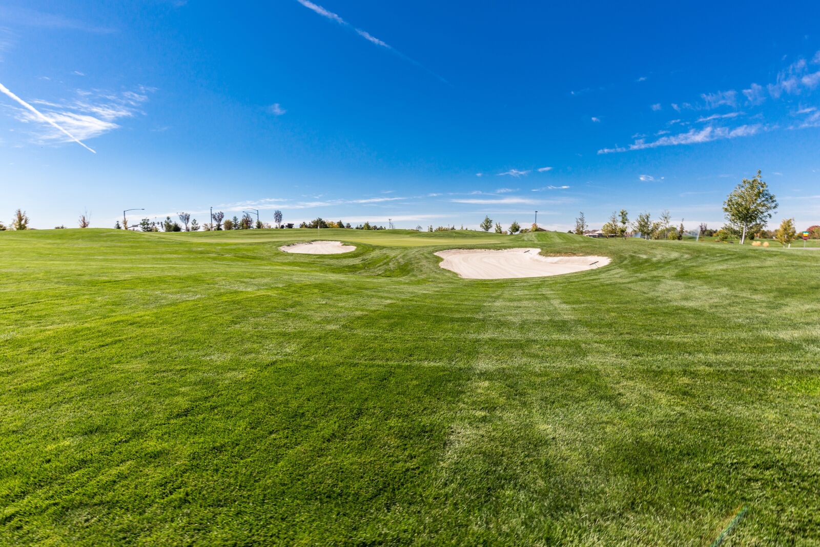 Canon EF 16-35mm F4L IS USM sample photo. Golf, outdoors, grass photography