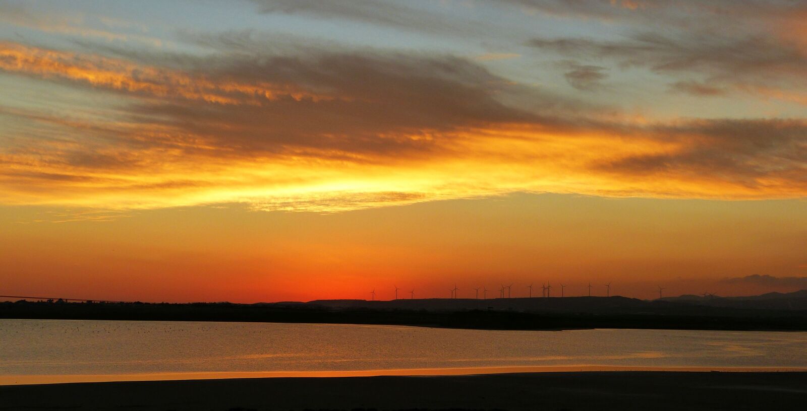 Panasonic Lumix DMC-FZ150 sample photo. Sunset, salt lake, environment photography