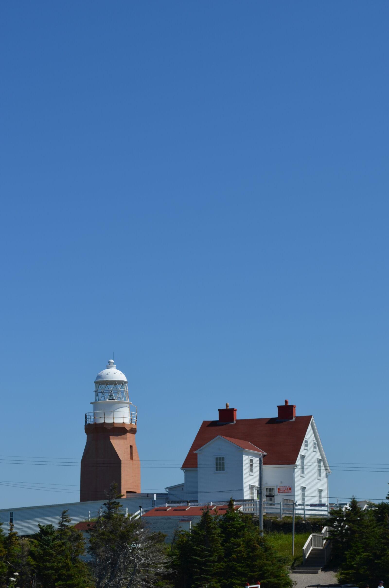 Nikon D5100 sample photo. Lighthouse, old farmhouse, blue photography