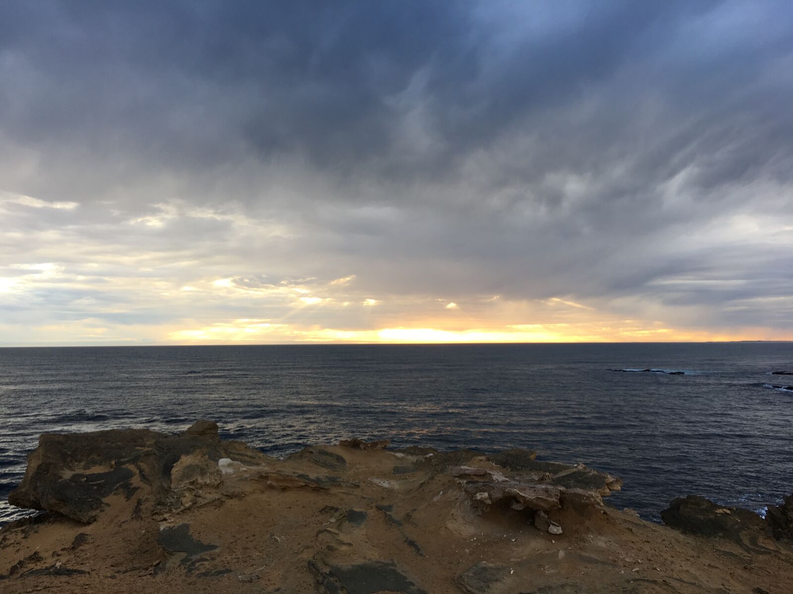 Apple iPhone 6s Plus sample photo. Rocks, water, clouds photography