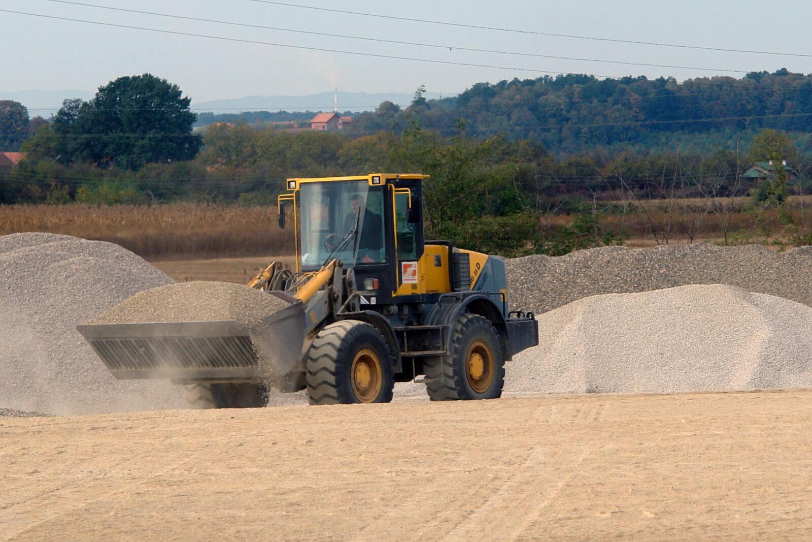 Sony DSC-R1 sample photo. Excavator, sand, industry photography