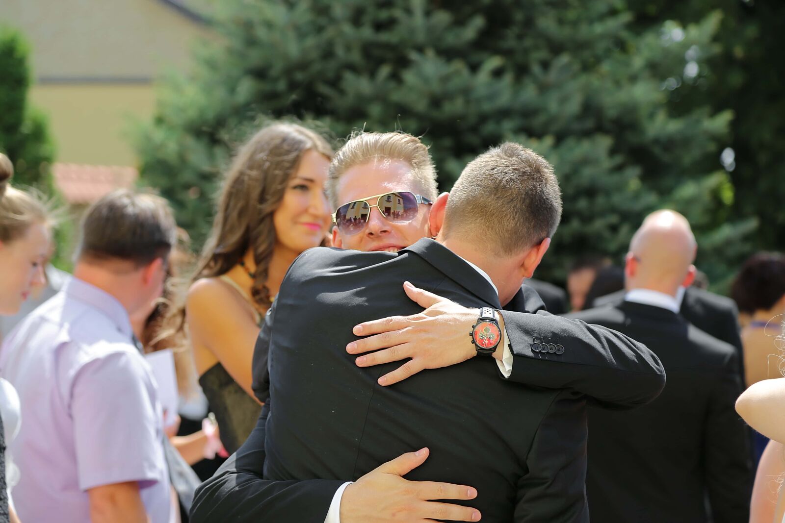Canon EF 24-105mm F4L IS USM sample photo. Men, businessperson, hugging, businessman photography