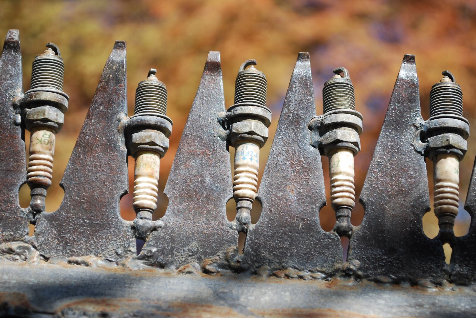 Nikon D60 sample photo. Spark plug, art, metal photography