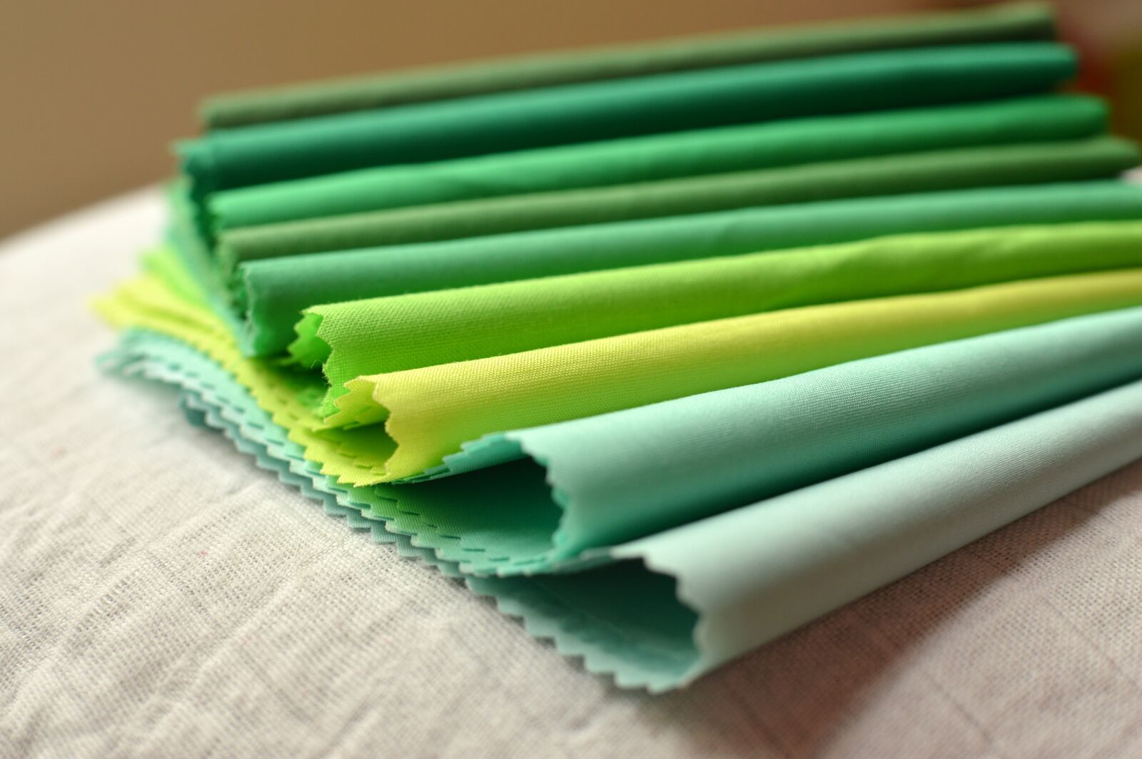 Nikon D3200 sample photo. Cotton, green cloth, light-colored photography