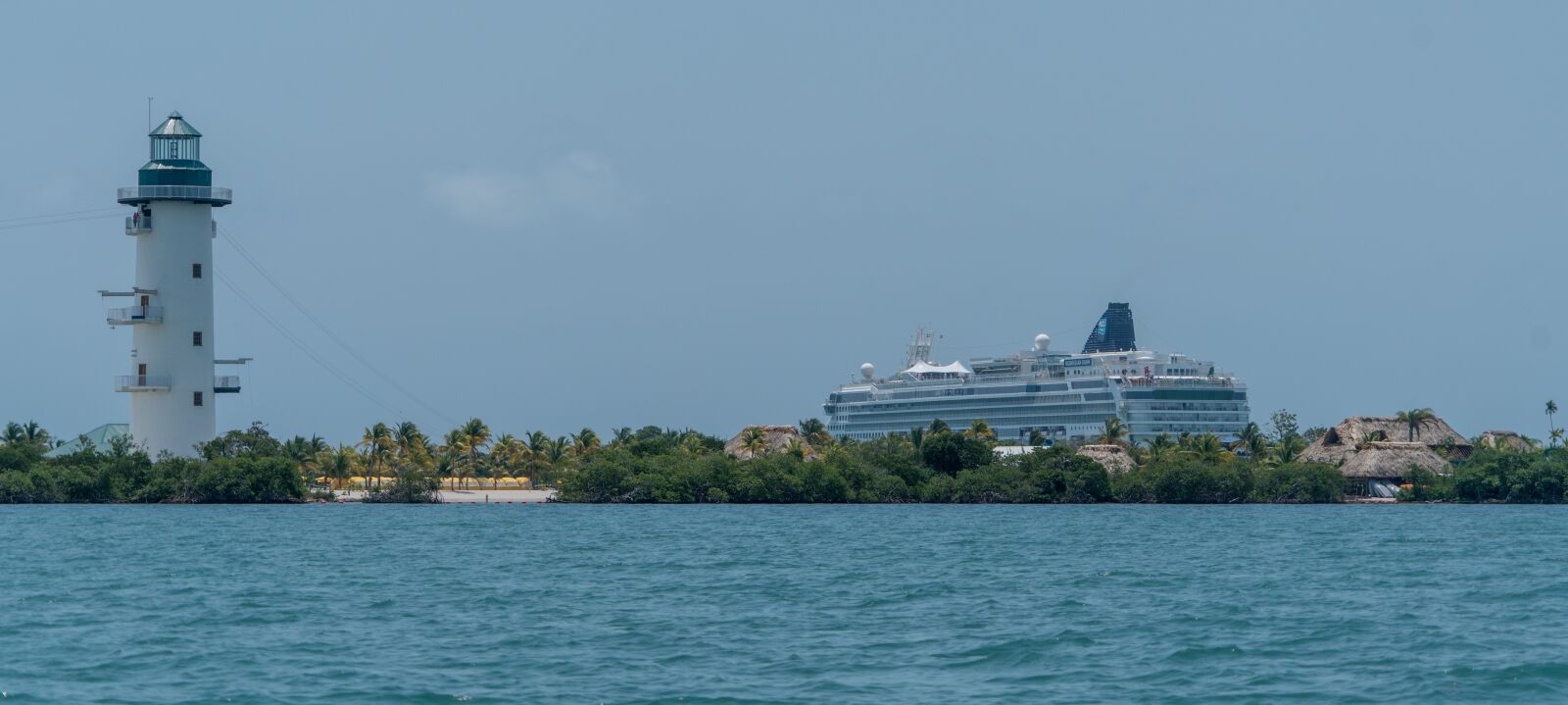 Sony a7R II + Sony FE 24-240mm F3.5-6.3 OSS sample photo. Lighthouse, cruise ship, belize photography