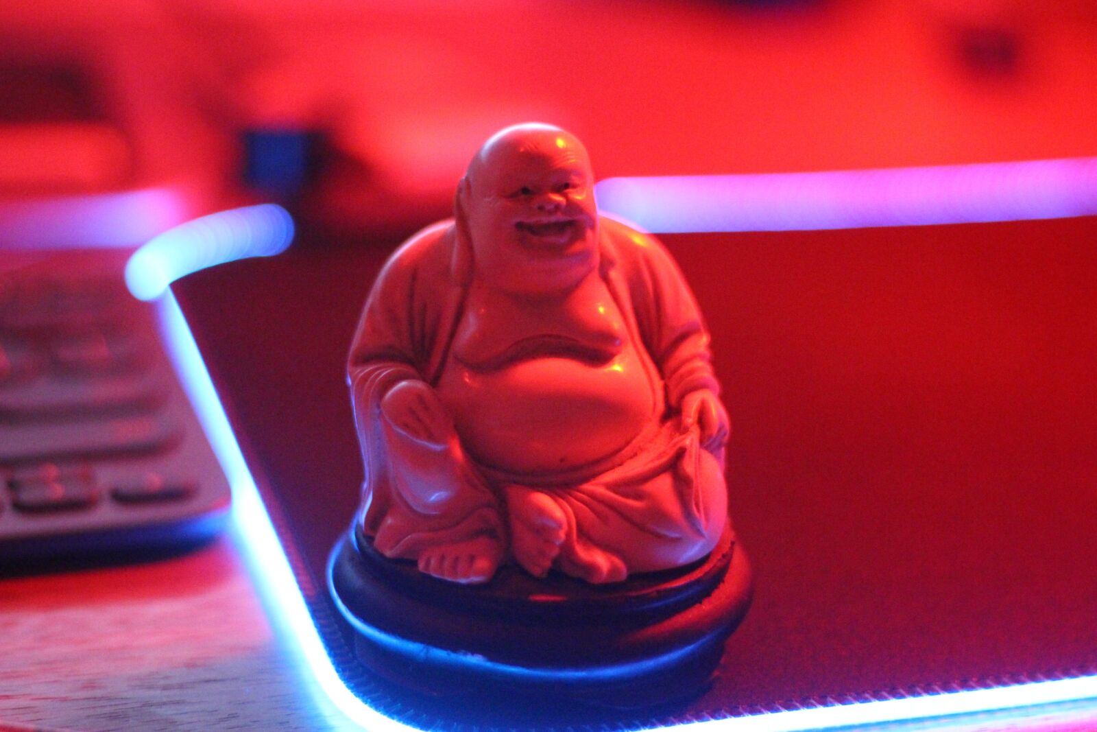 Canon EOS 100D (EOS Rebel SL1 / EOS Kiss X7) + Canon EF 50mm F1.8 STM sample photo. Buddha, red, light photography