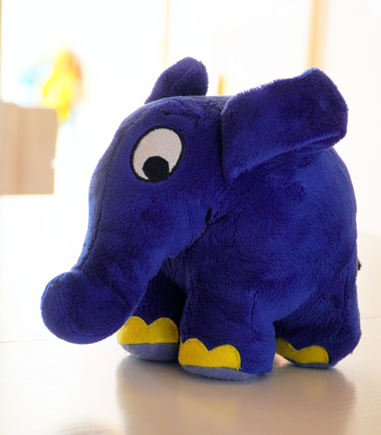 Sony E PZ 18-105mm F4 G OSS sample photo. Elephant, blue, toys photography