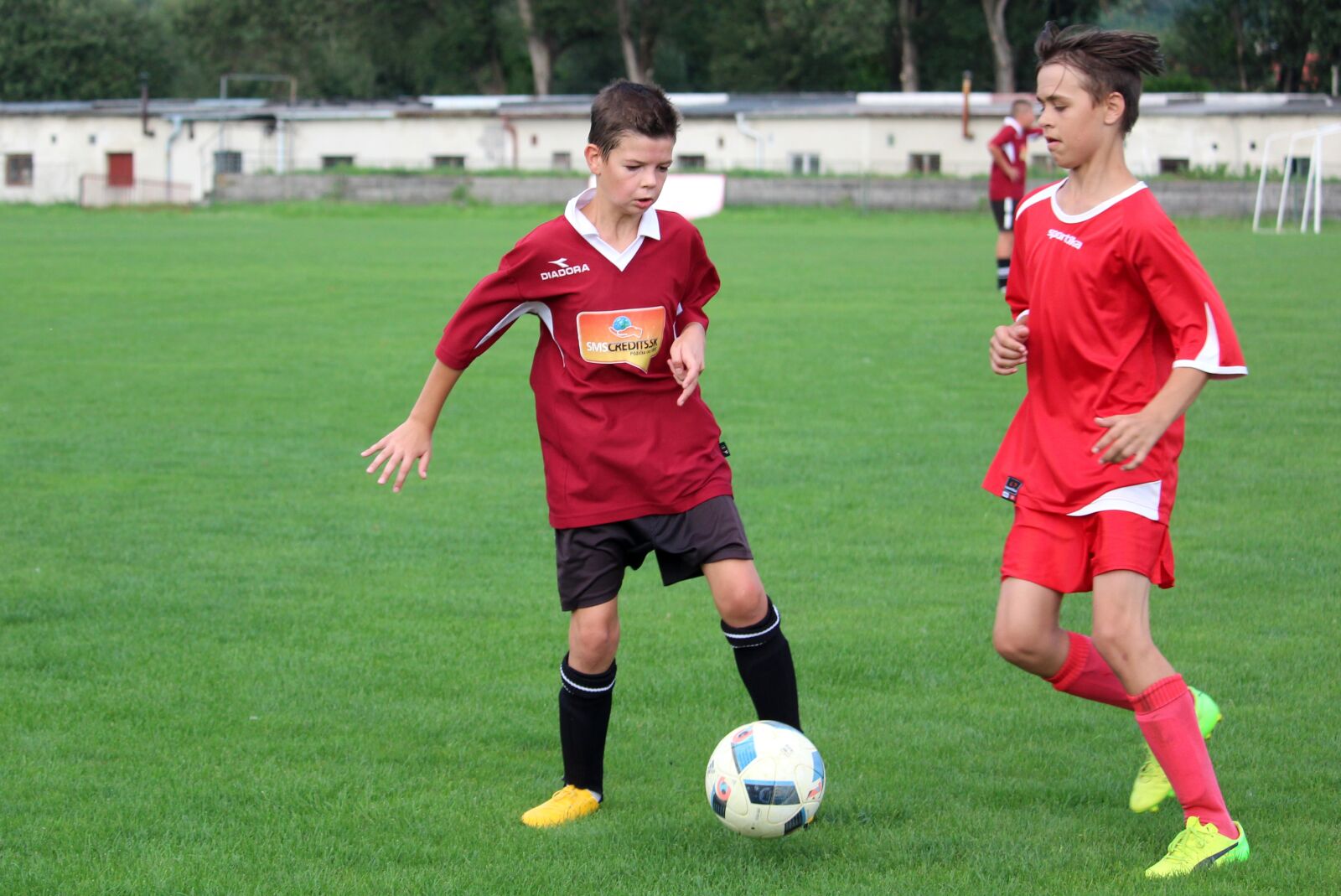 Canon EF-S 55-250mm F4-5.6 IS STM sample photo. Football, pupils, older pupils photography