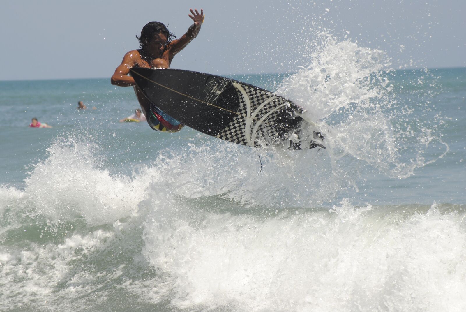 Nikon D3000 sample photo. Surfer, surf, action photography