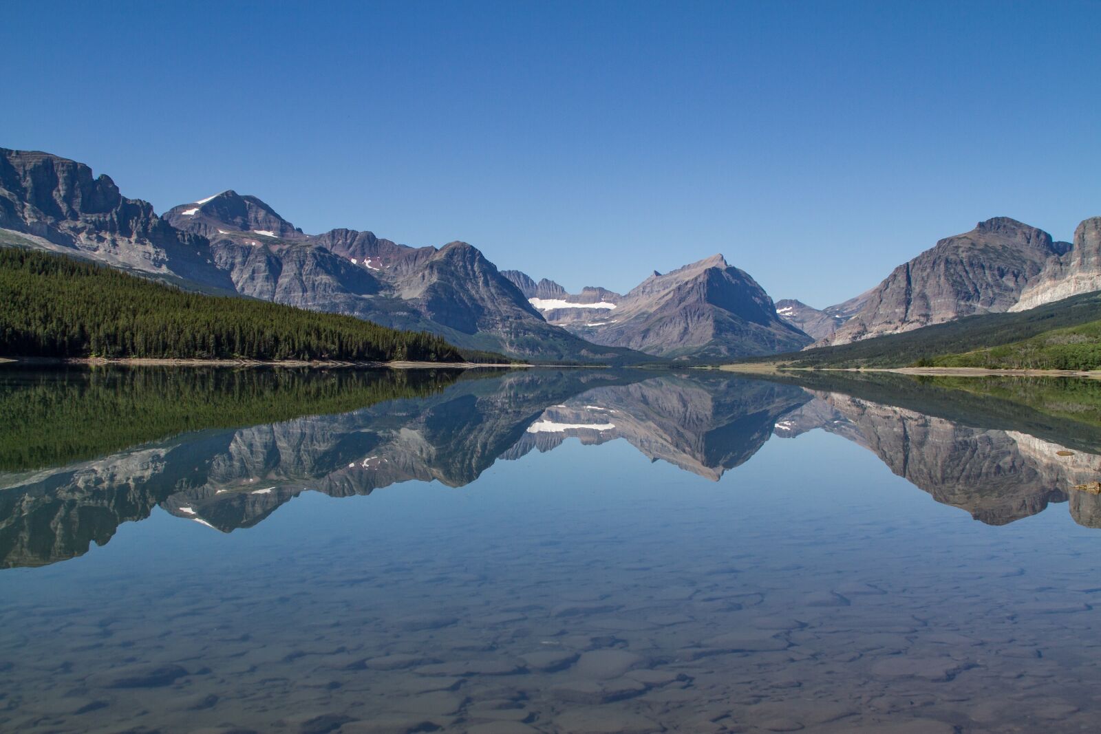 Canon EOS 7D + Canon EF 28-135mm F3.5-5.6 IS USM sample photo. Lake sherburne, mountains, calm photography