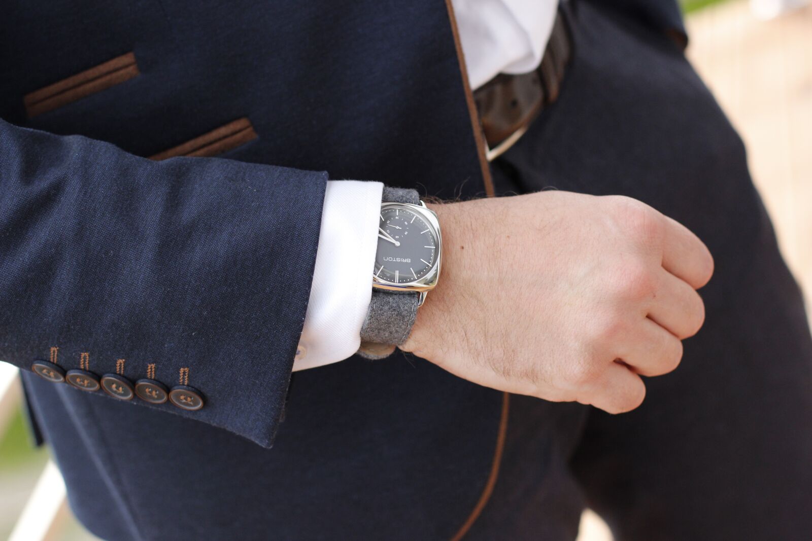 Canon EOS 600D (Rebel EOS T3i / EOS Kiss X5) + Canon EF 50mm F1.4 USM sample photo. Watch, hand, suit photography