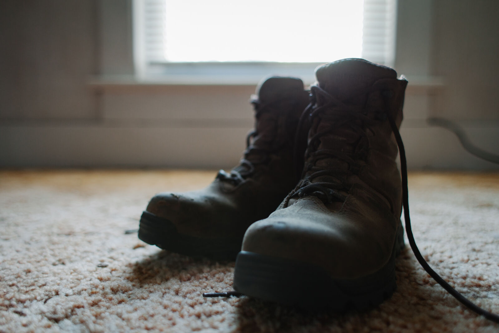 Canon EOS 5D Mark II + Canon EF 28mm F1.8 USM sample photo. Boots, floor, shoes, window photography
