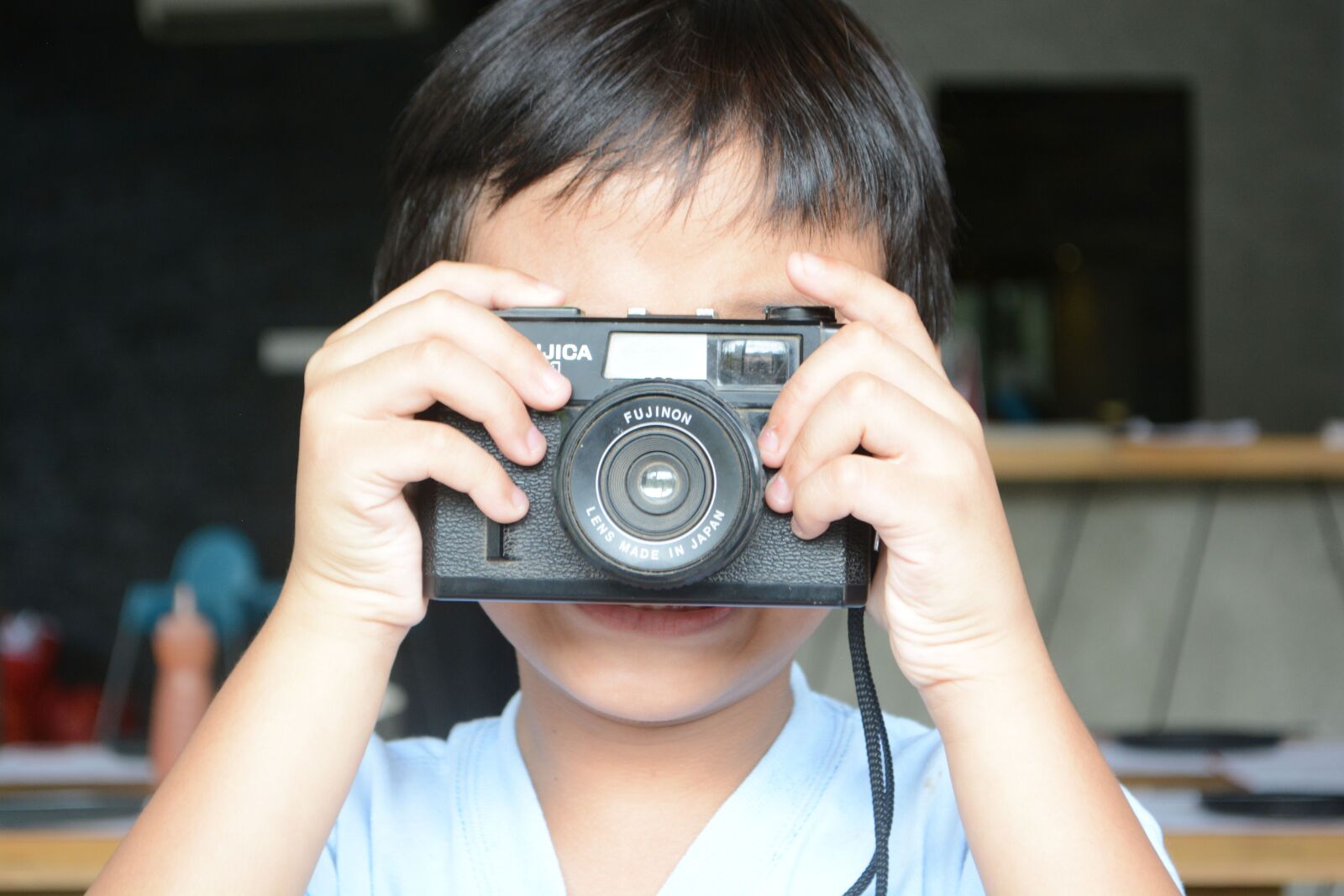 Nikon D5200 + Nikon AF-S DX Nikkor 18-55mm F3.5-5.6G VR sample photo. Boy, camera, child, kid photography
