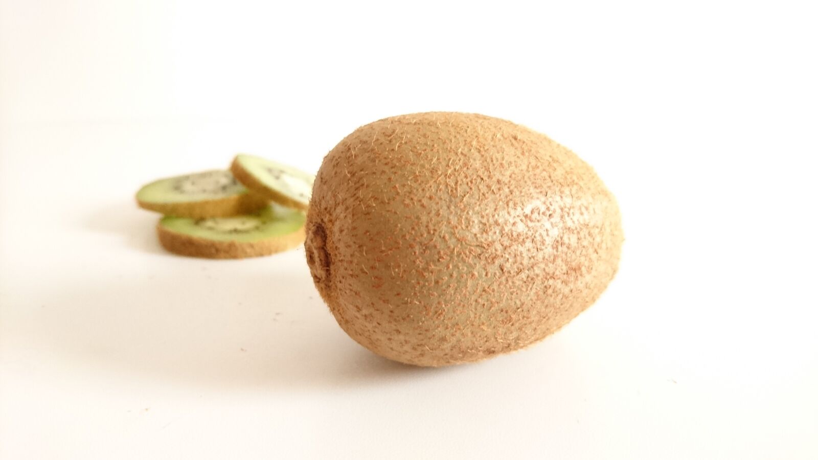 Sony Xperia Z5 sample photo. Kiwi, fruit, green photography