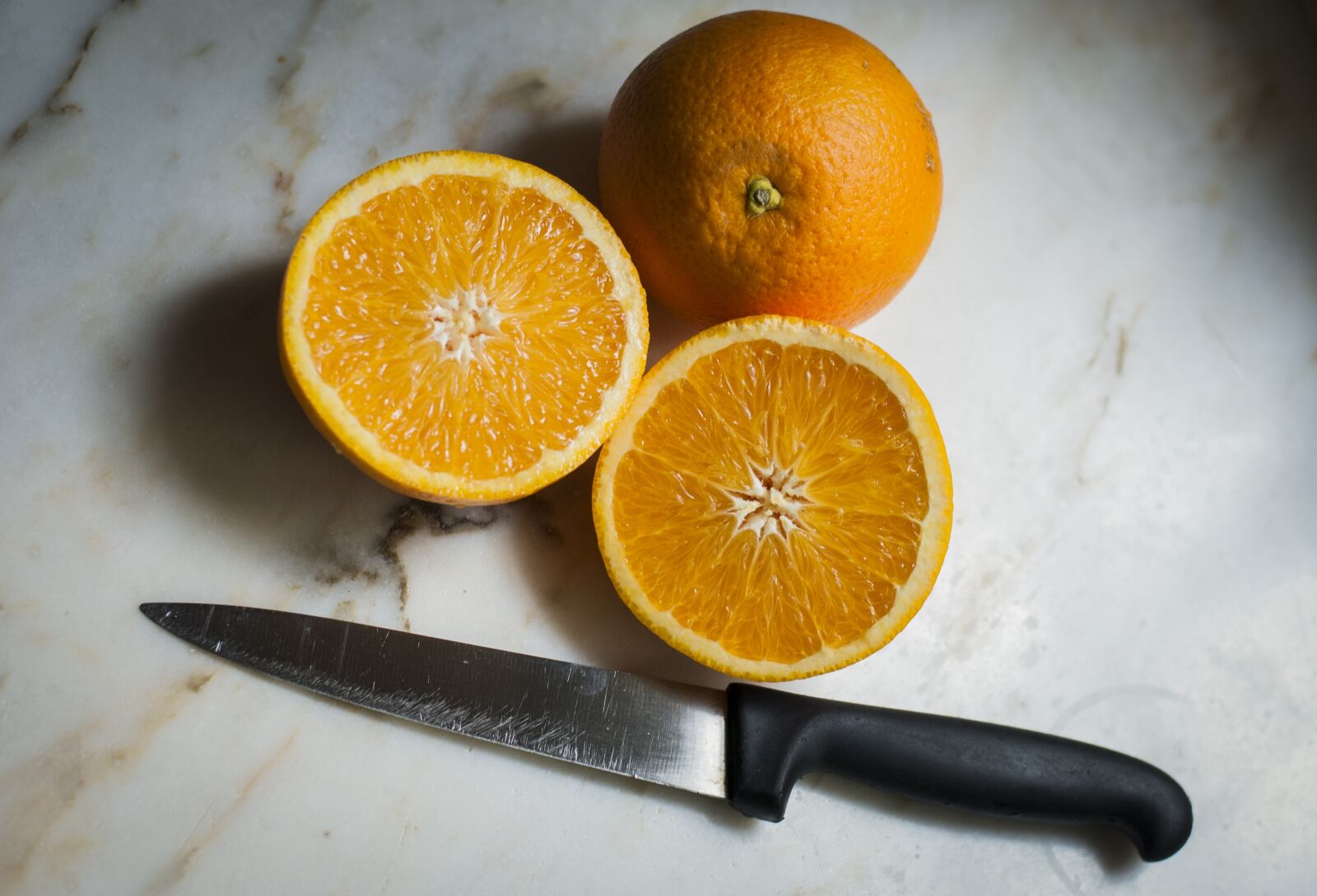 Nikon D3000 sample photo. Orange, fruit, table photography