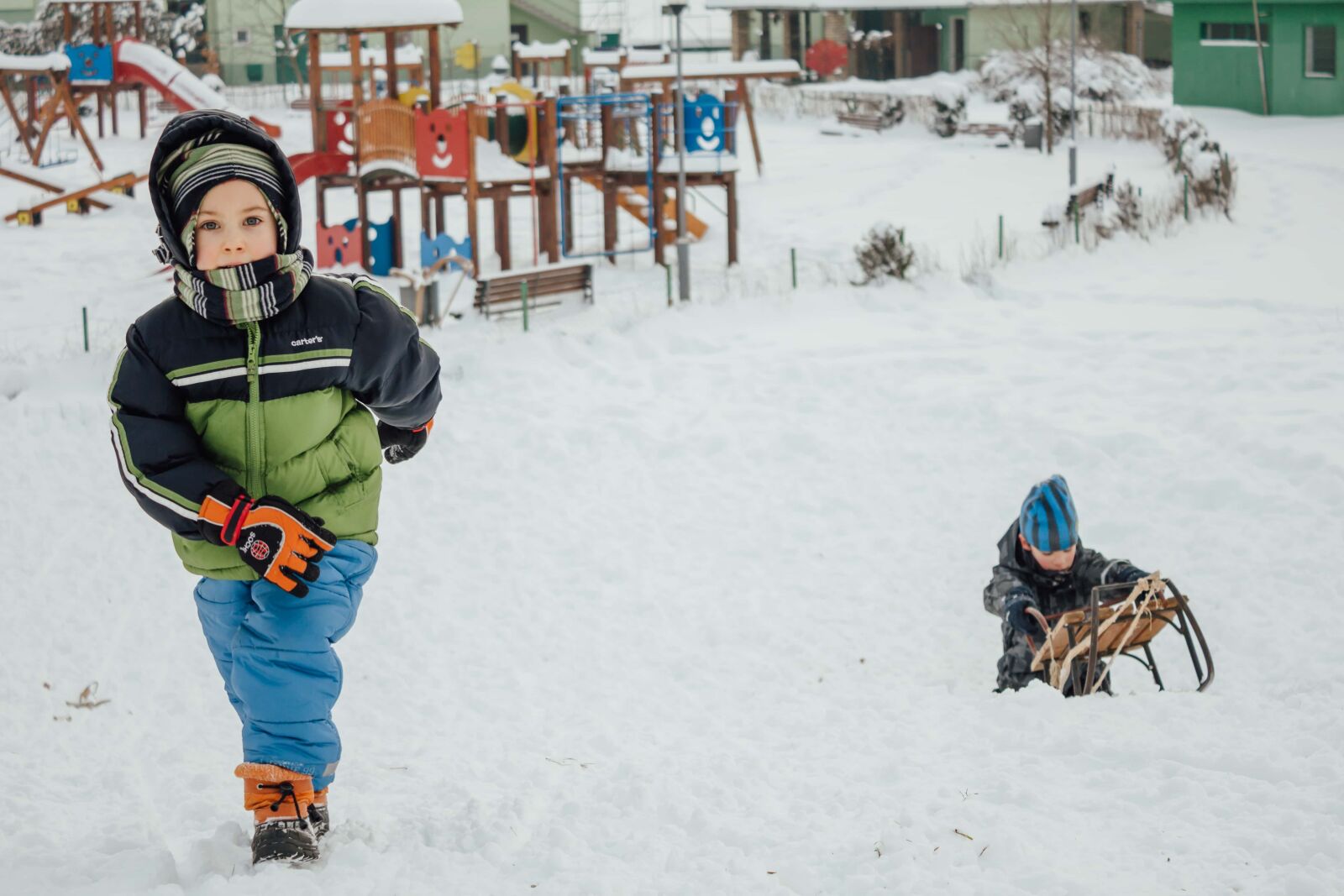 Canon EF-S 18-55mm F3.5-5.6 IS sample photo. Boys, sled, winter, playground photography