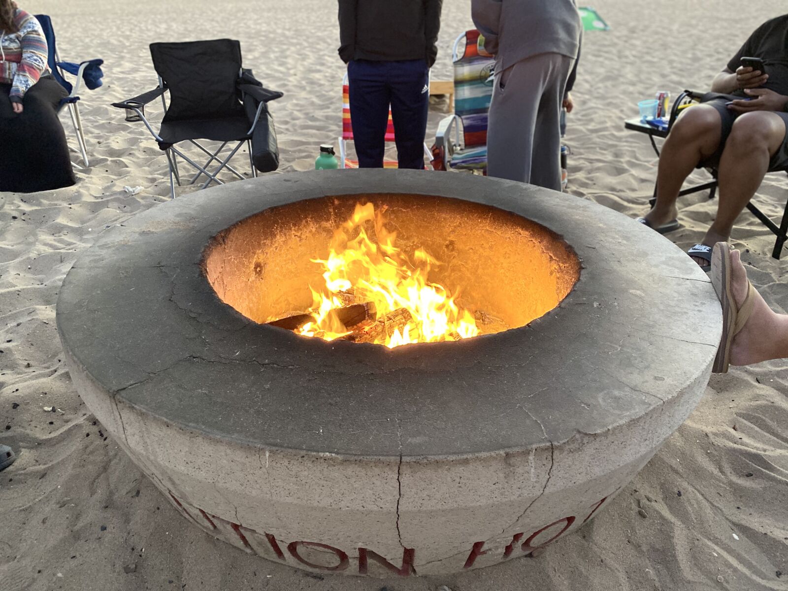 Apple iPhone 11 sample photo. Campfire, beach pit, fire photography