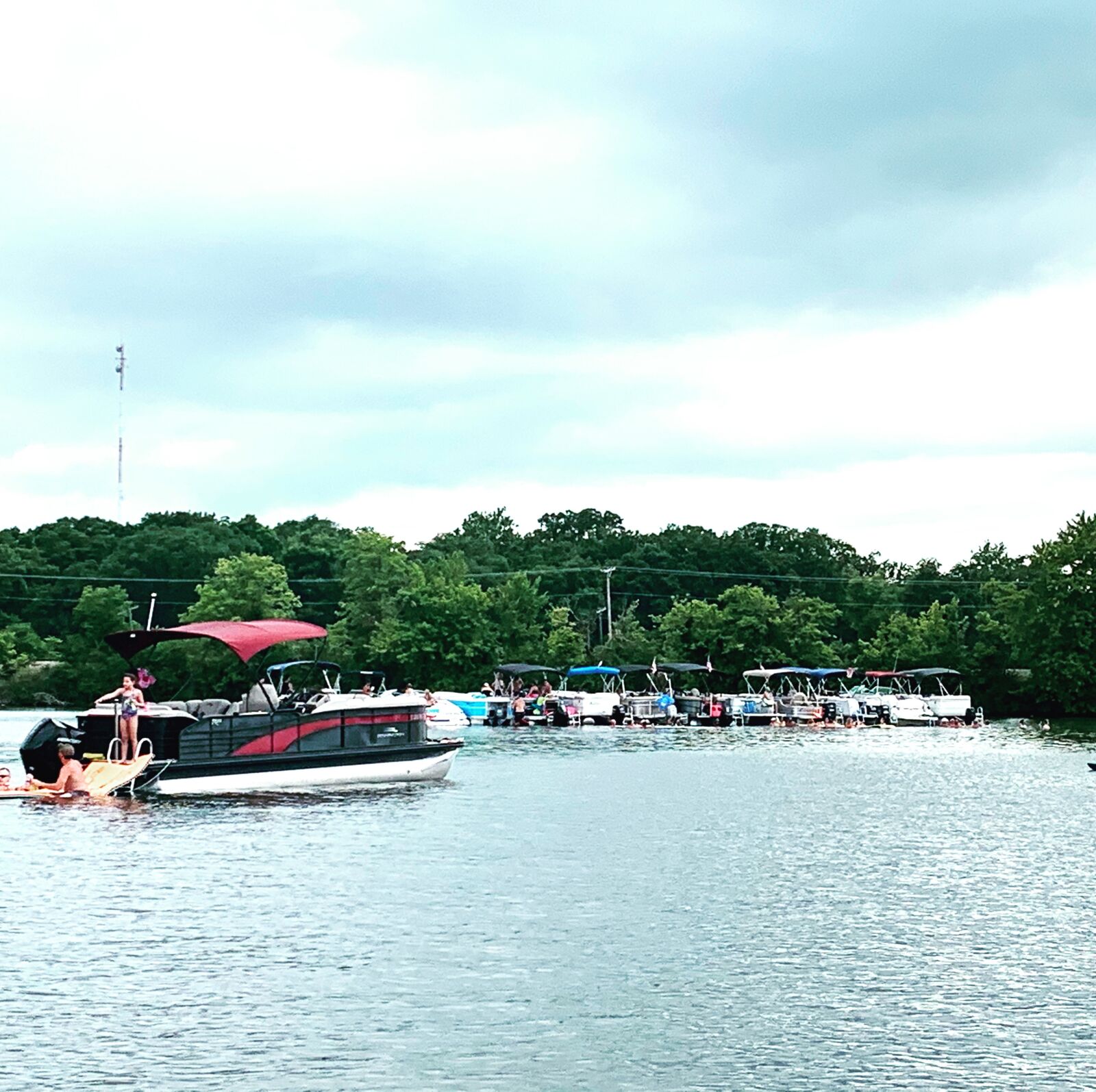 iPhone XR back camera 4.25mm f/1.8 sample photo. Lake, water, boat photography