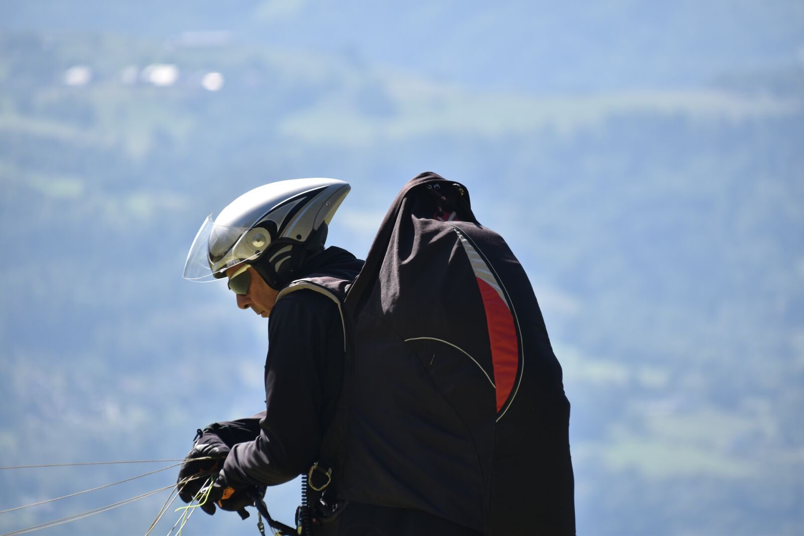 Nikon D5600 sample photo. Paraglider, paragliding, headset profile photography