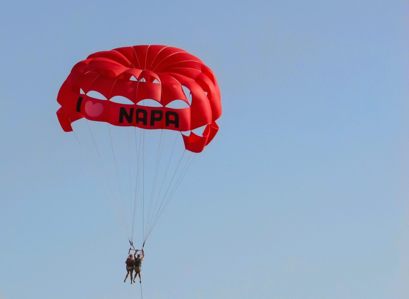 Canon PowerShot SX400 IS sample photo. Parachute, paragliding, red photography