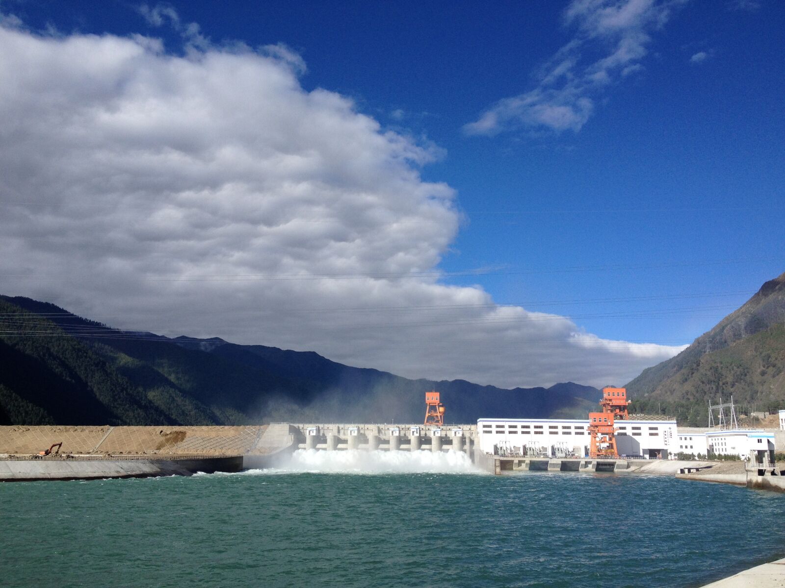 Apple iPhone 4S sample photo. Hydropower, blue sky, building photography