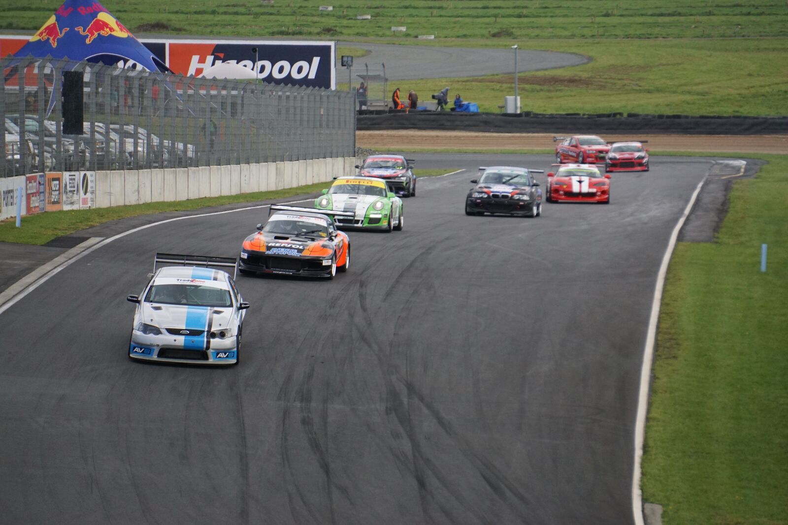 Sony E 55-210mm F4.5-6.3 OSS sample photo. Cars, car race, racing photography