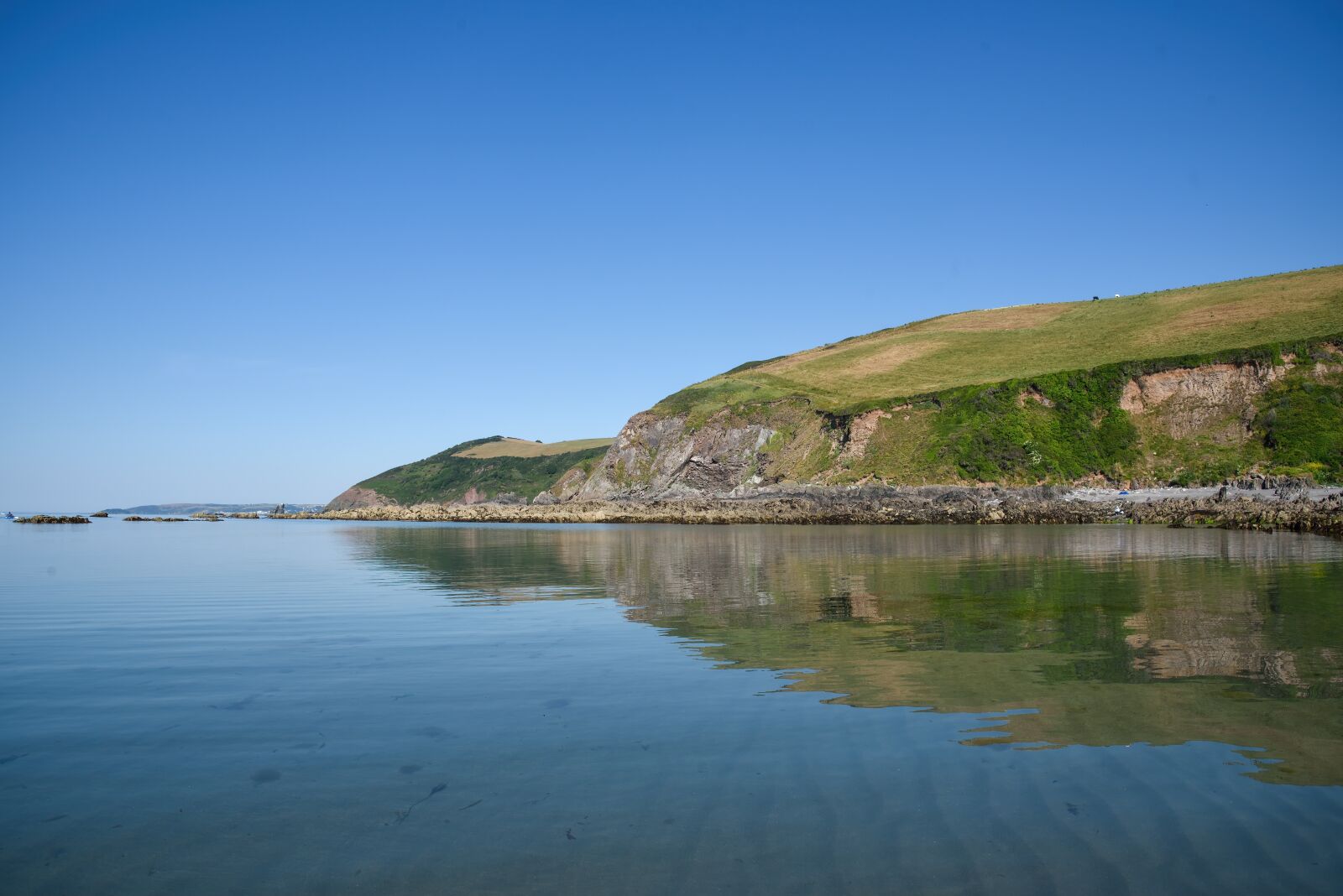 Nikon D750 sample photo. Tranquil sea, rocks, ocean photography
