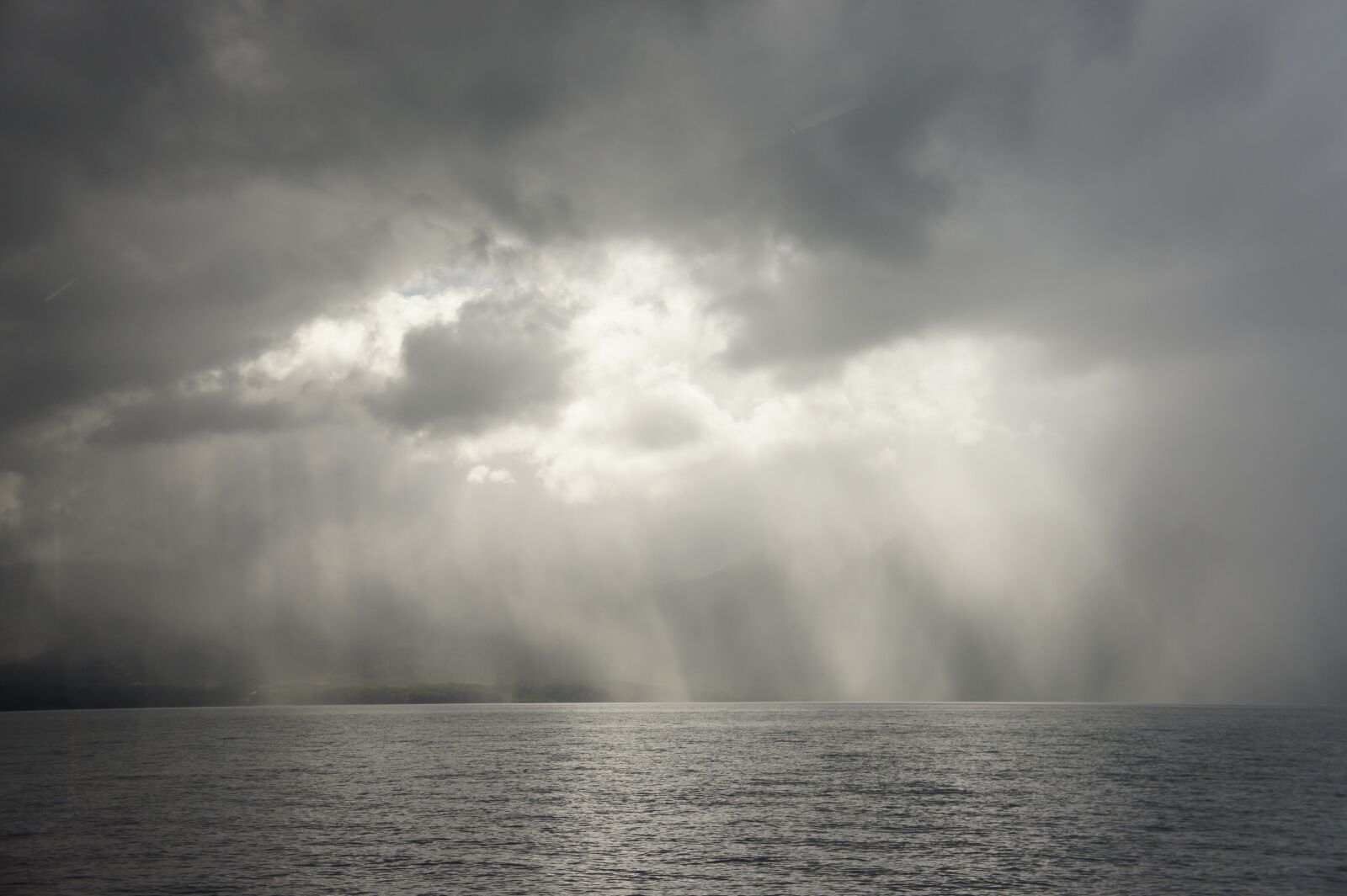 Sony Alpha NEX-3 + Sony E 18-55mm F3.5-5.6 OSS sample photo. Chiloé, clouds, storm photography