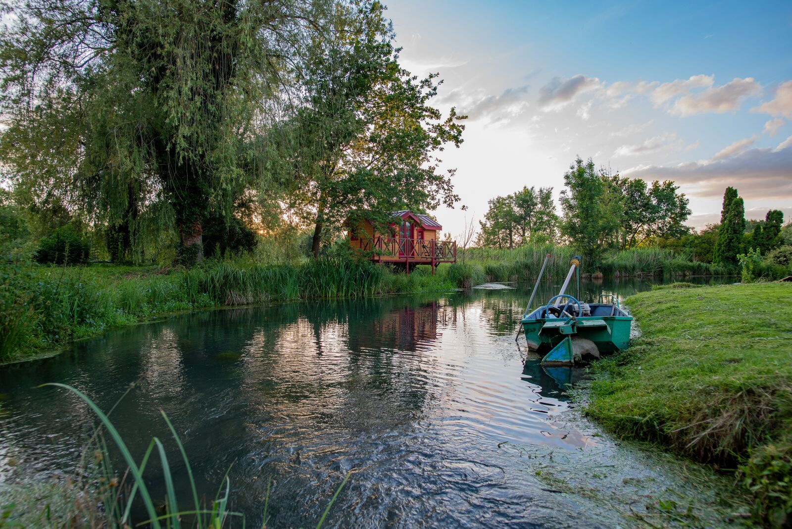Nikon D750 sample photo. Pond, cabin, boat photography