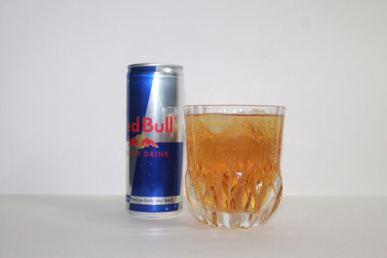 Canon EOS 1100D (EOS Rebel T3 / EOS Kiss X50) sample photo. Red, bull, glass, cann photography