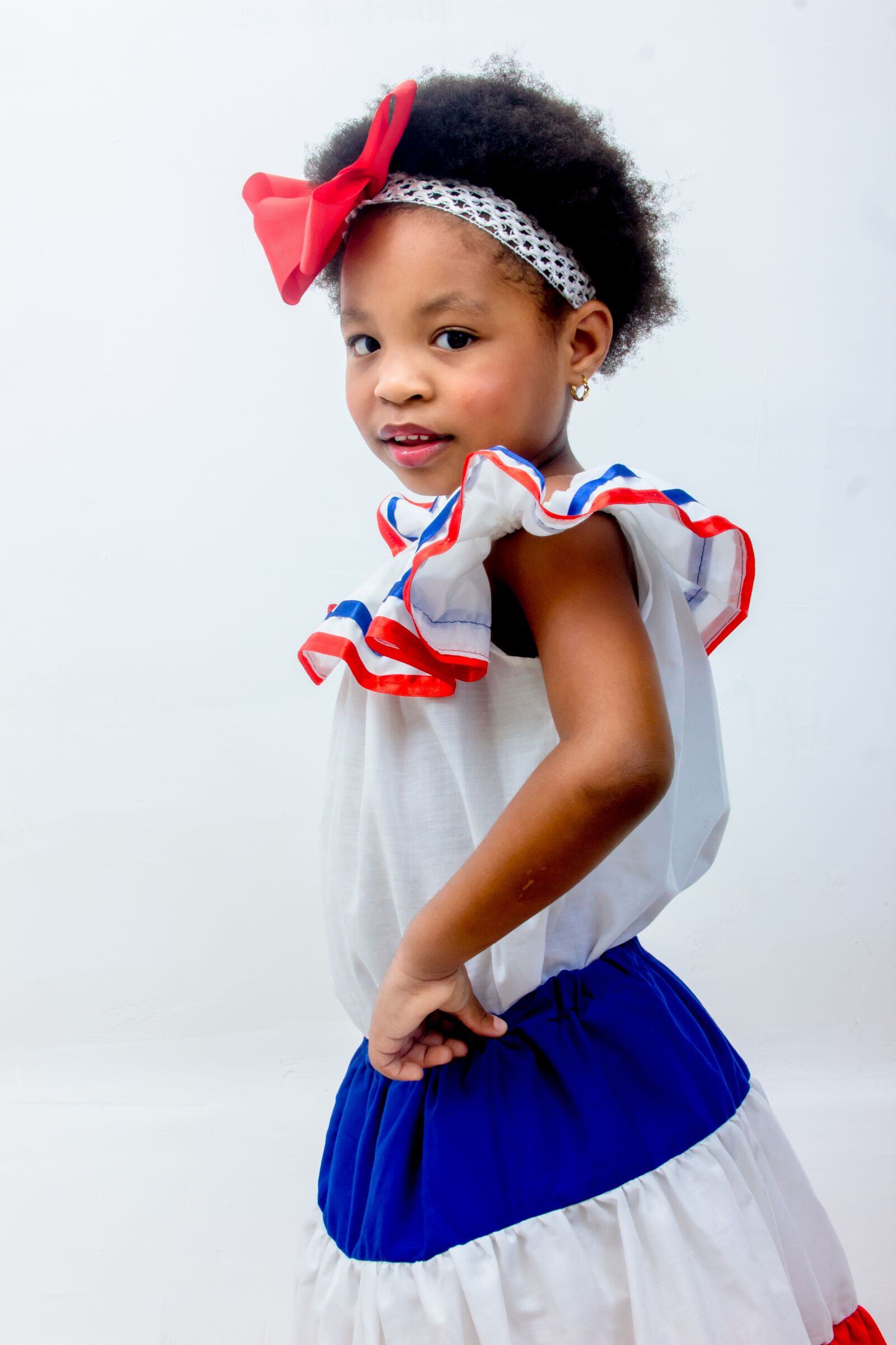 Canon EF 28-135mm F3.5-5.6 IS USM sample photo. Dominican, girl, dress photography