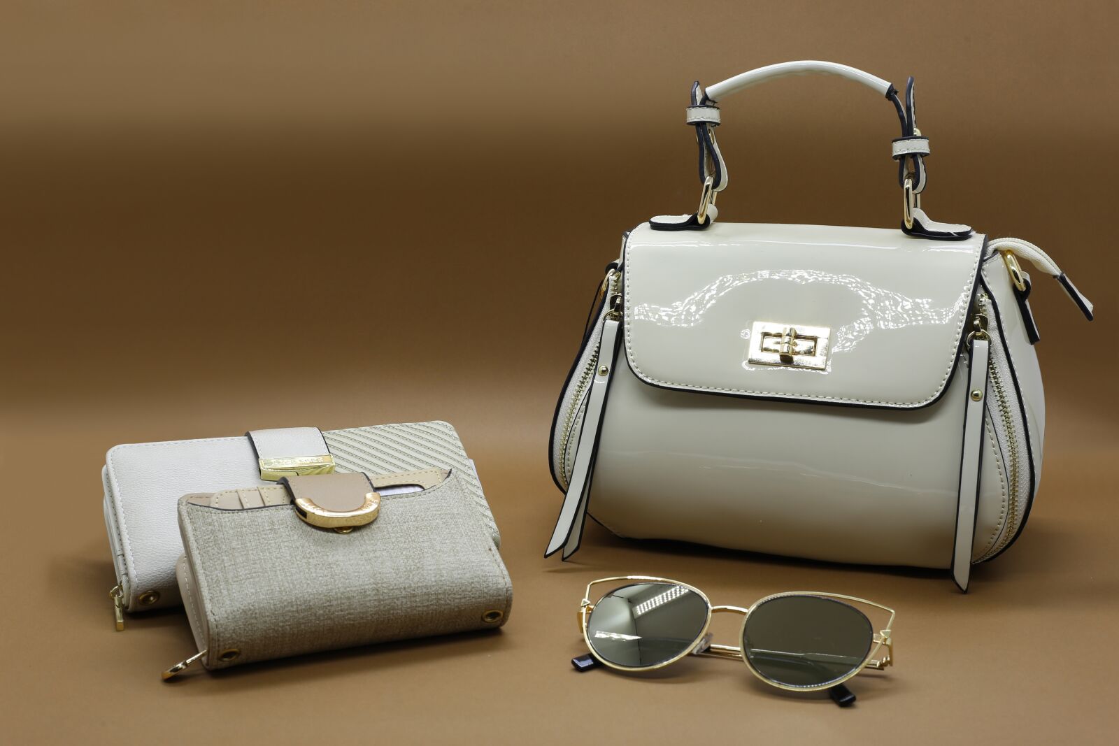 Canon EF 50mm F1.8 II sample photo. Scholarships, glasses, wallets photography
