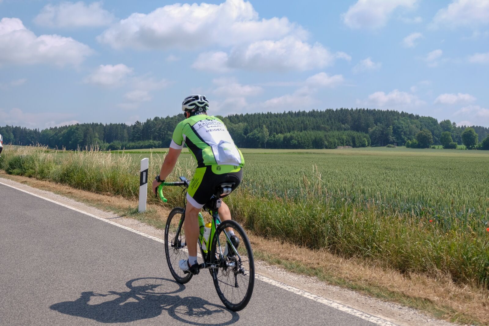 Fujifilm XF 16-55mm F2.8 R LM WR sample photo. Road bike, cyclists, rtf photography